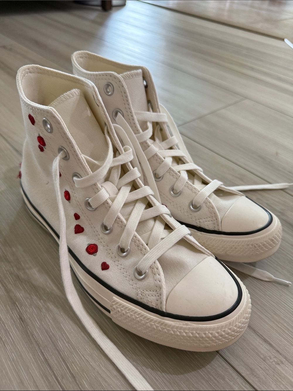 White High-Top Converse Sneakers with Red Heart Accents